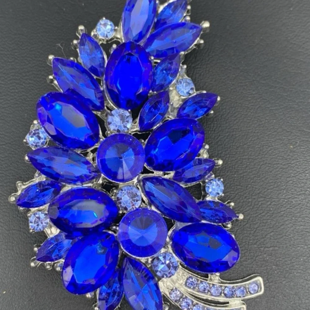Silver tone and Large blue rhinestone brooch